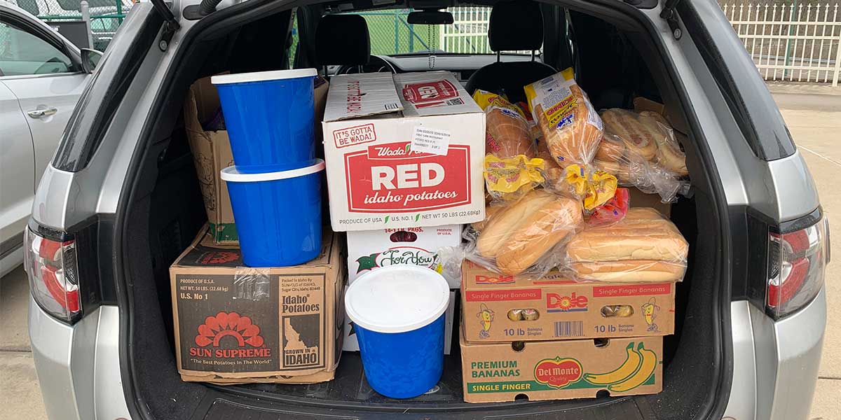 Vehicle loaded with food for Team Mardi Gras to donate to United Way of Central West Virginia