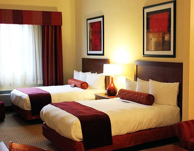 Deluxe Junior Hotel Suite with 2 Queen Beds | Mardi Gras Casino & Resort Cross Lanes, WV