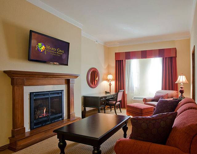 Presidential Suite with 1 King Bed and living room area Hotel Room | Mardi Gras Casino & Resort Cross Lanes, WV