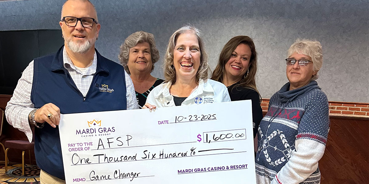 Presenting the Game CHanger donations to AFSP